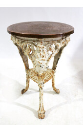 A Victorian cast iron Britannia table with pressed copper top 1