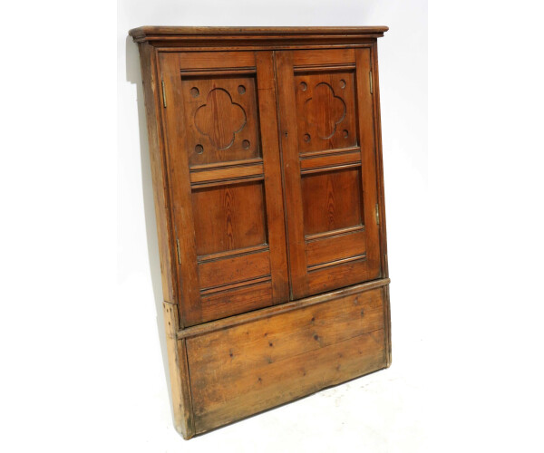 A 19th century gothic pine narrow cupboard 1