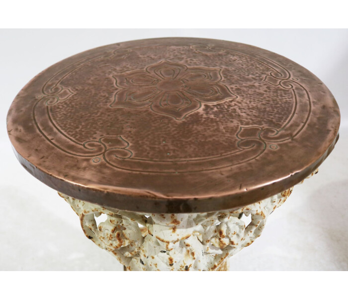 A Victorian cast iron Britannia table with pressed copper top 2