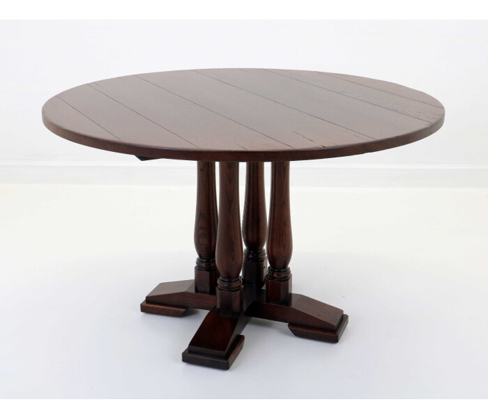 A fantastic quality four seater solid oak dining table 1