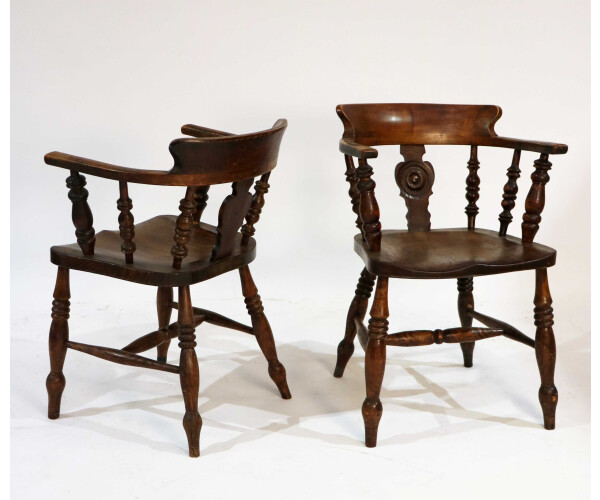 A pair of late 19th century smokers Bows captains chairs 1