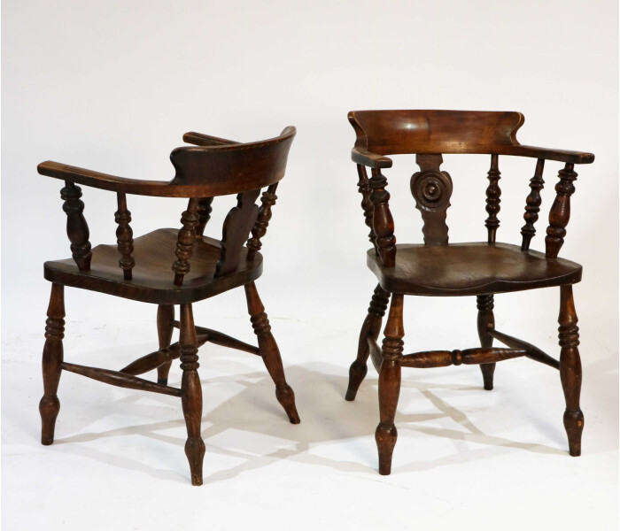 A pair of late 19th century smokers Bows captains chairs 1