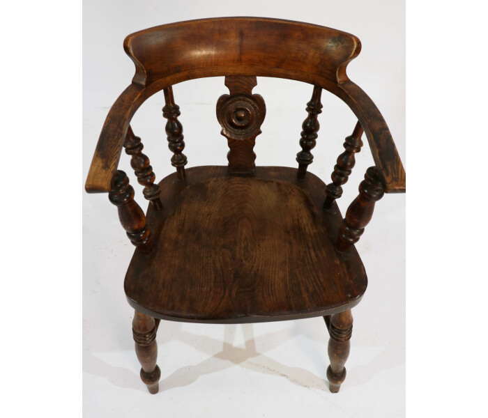 A pair of late 19th century smokers Bows captains chairs 4
