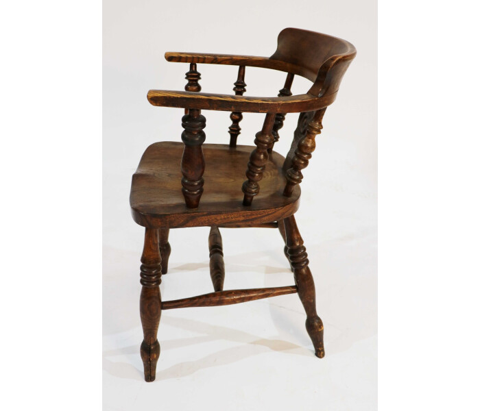 A pair of late 19th century smokers Bows captains chairs 5