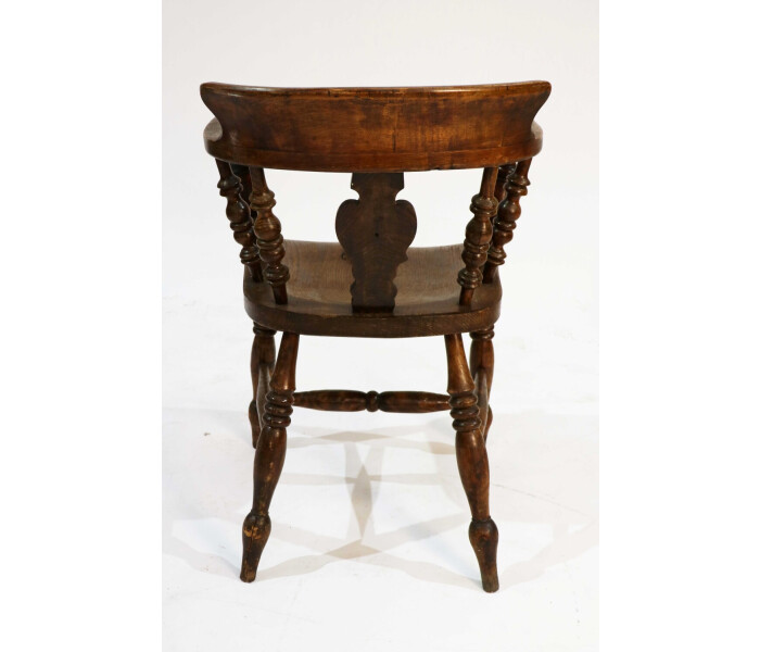 A pair of late 19th century smokers Bows captains chairs 6
