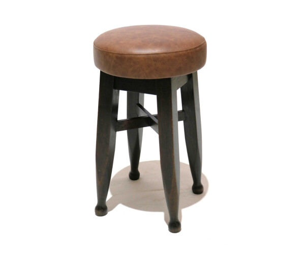 An Upholstered Low Bar Stool 1