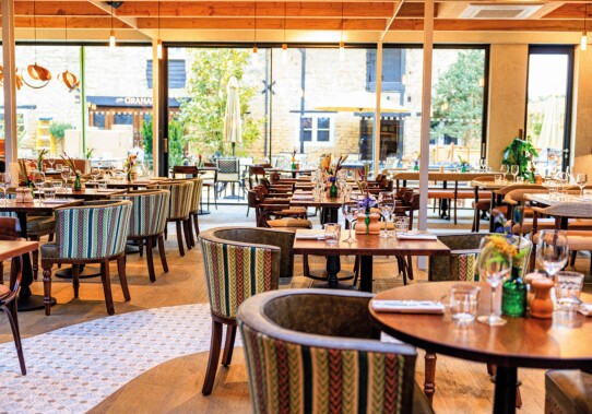 GJB restaurant overlooking courtyard garden credit Oakman Group